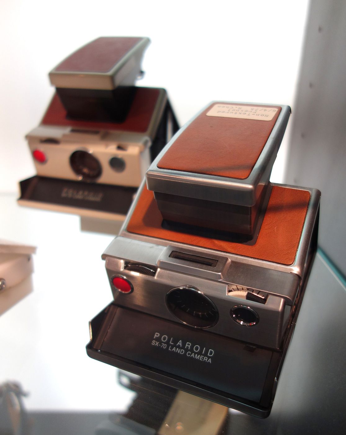 A folding Polaroid SX-70 instant camera